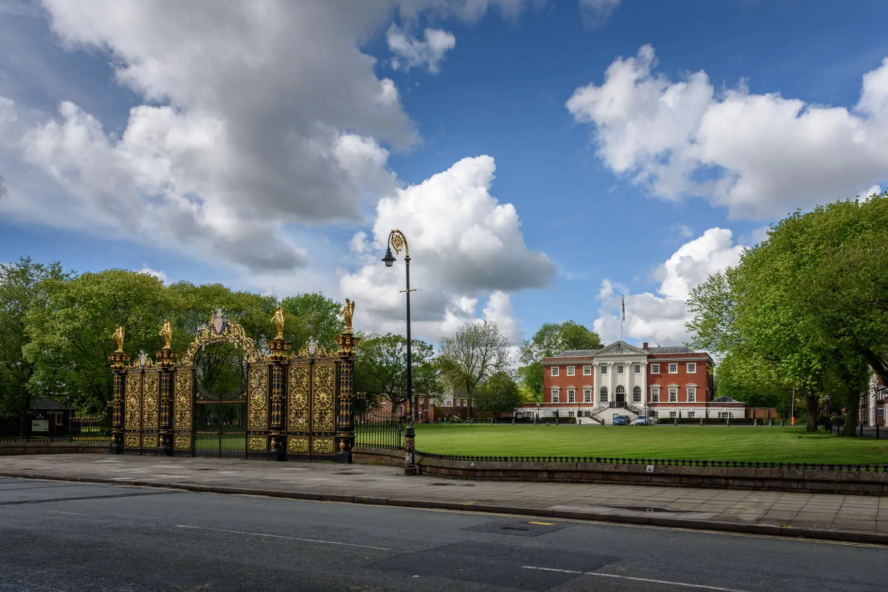 Warrington Town Hall and its Golden Gates on a sunny day